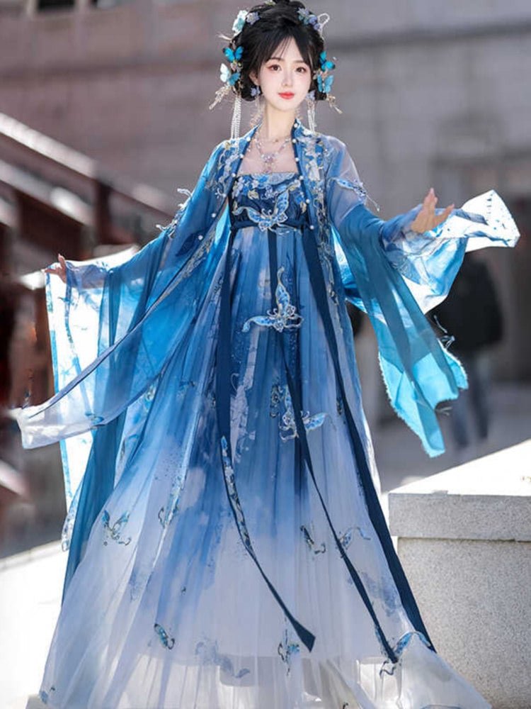 Side view of the blue Hanfu dress with wide sleeves and butterfly embroidery.
