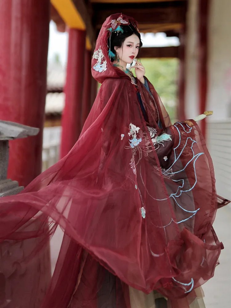 Hanfu model standing by traditional pillars