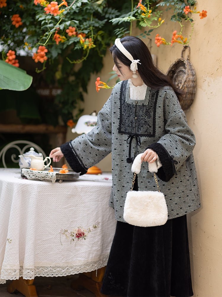 Model wearing black and white rose-patterned Hanfu outfit