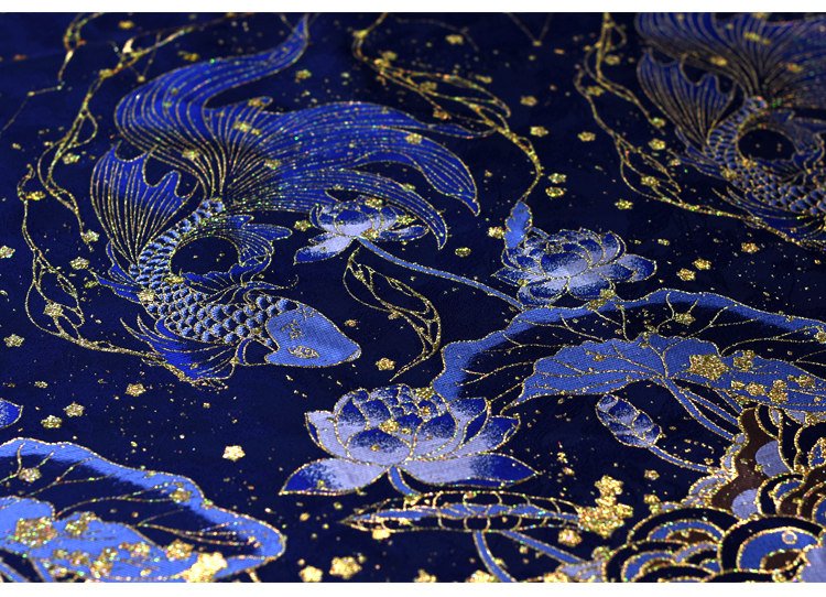 Blue celestial embroidery with shimmering gold stars