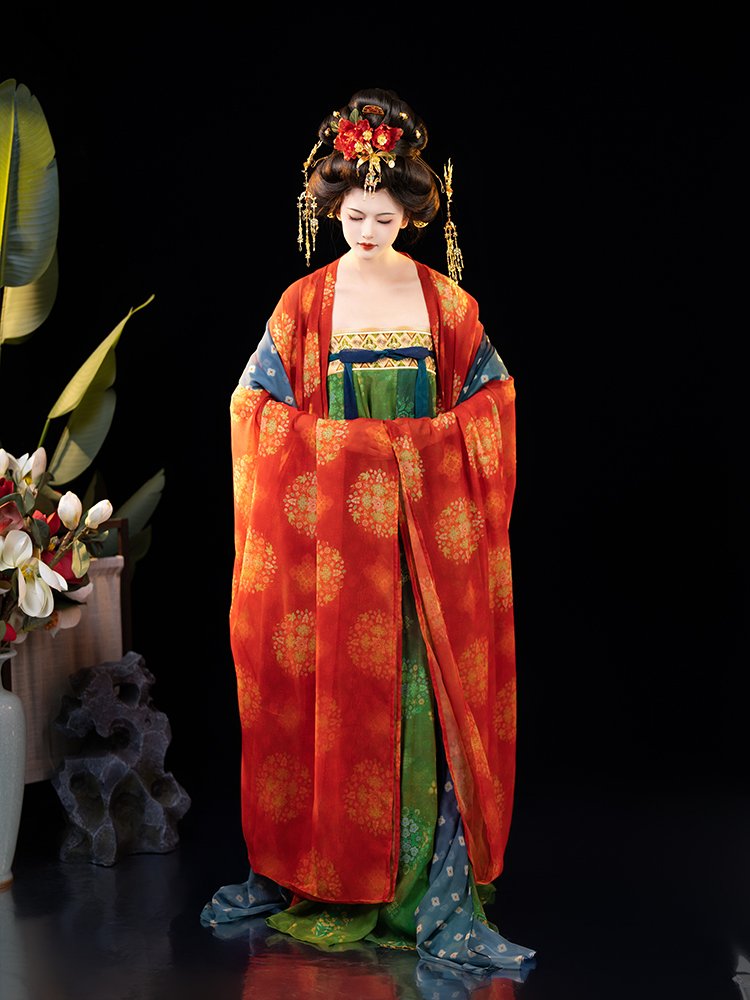 Wide sleeve Dunhuang Hanfu dress with red-gold patterns and artistic cave-inspired motifs