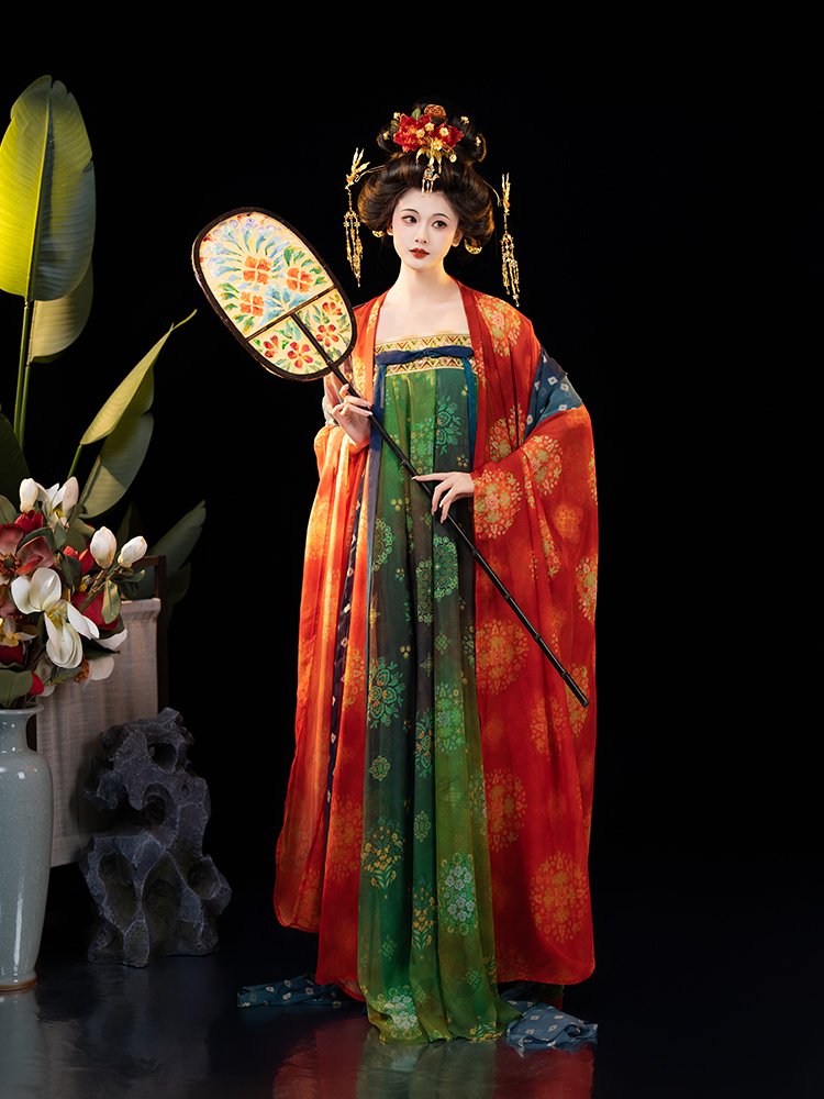 Model holding a traditional round fan while wearing Dunhuang style Hanfu dress