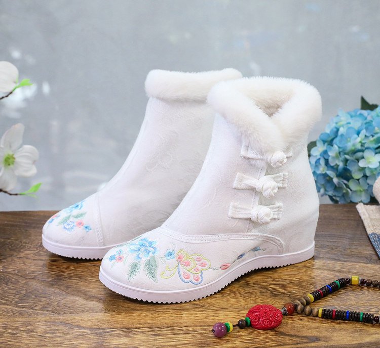 Front view of white embroidered Hanfu boots