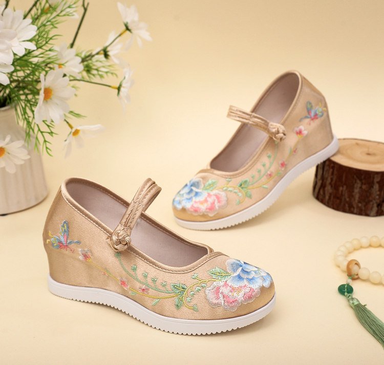 Back view of embroidered platform Mary Jane shoes