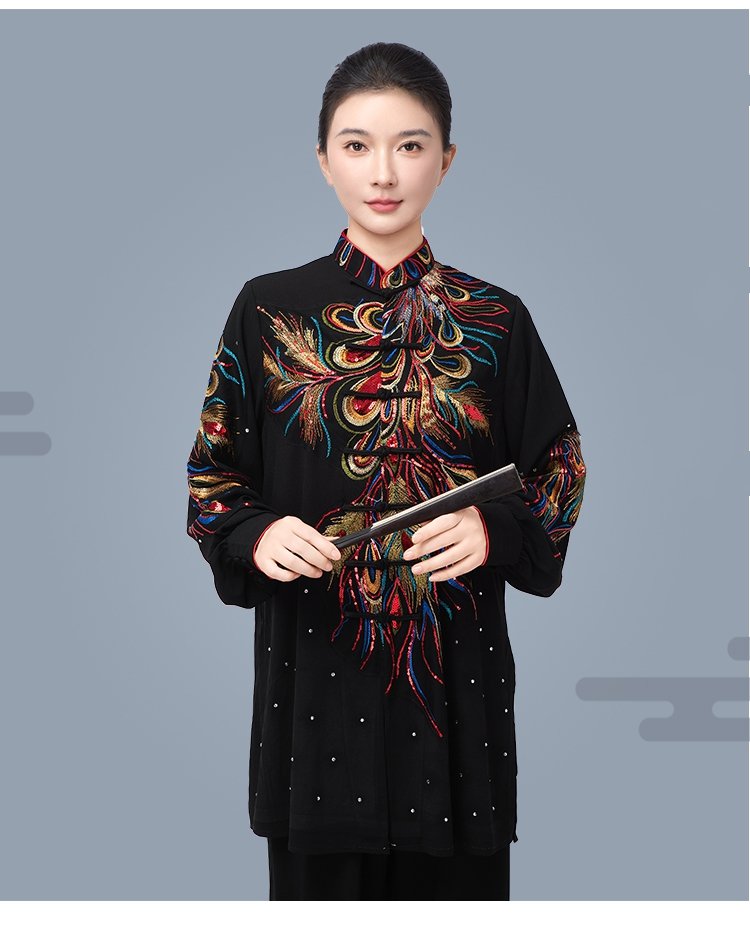 Model wearing embroidered Tai Chi uniform showing upper and lower design