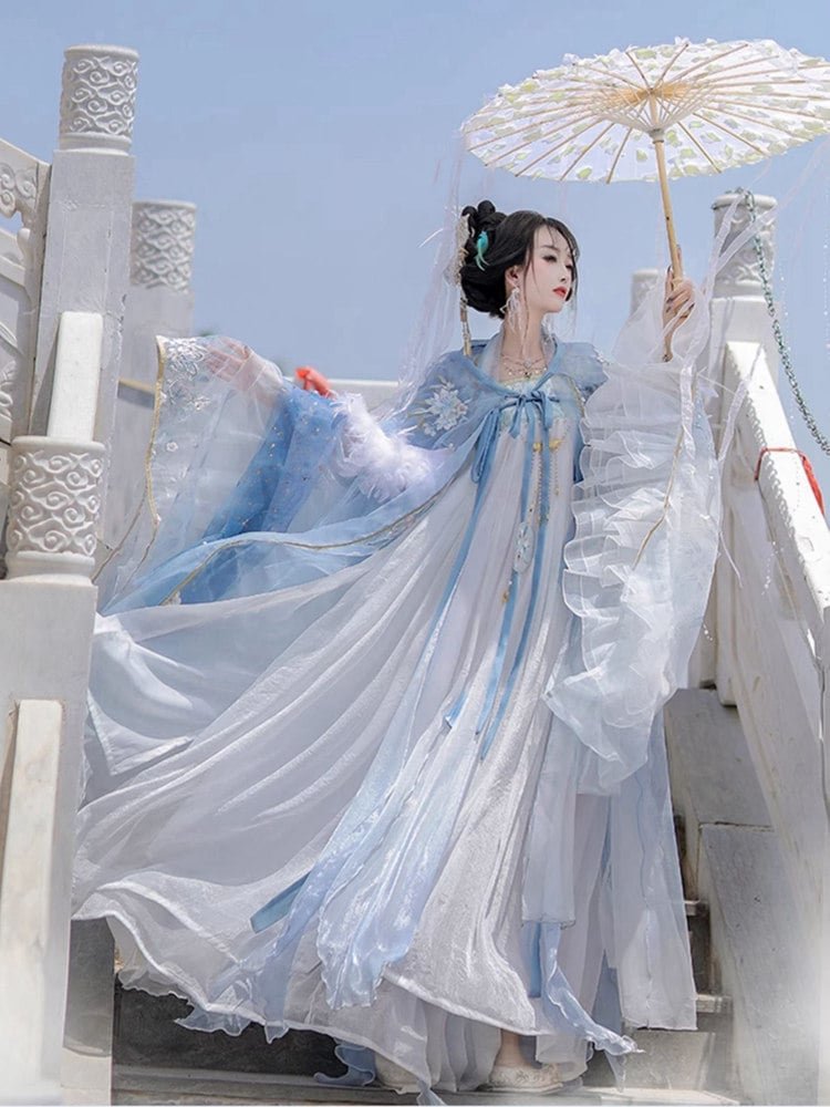 Model in blue Tang-style Hanfu with cape and parasol