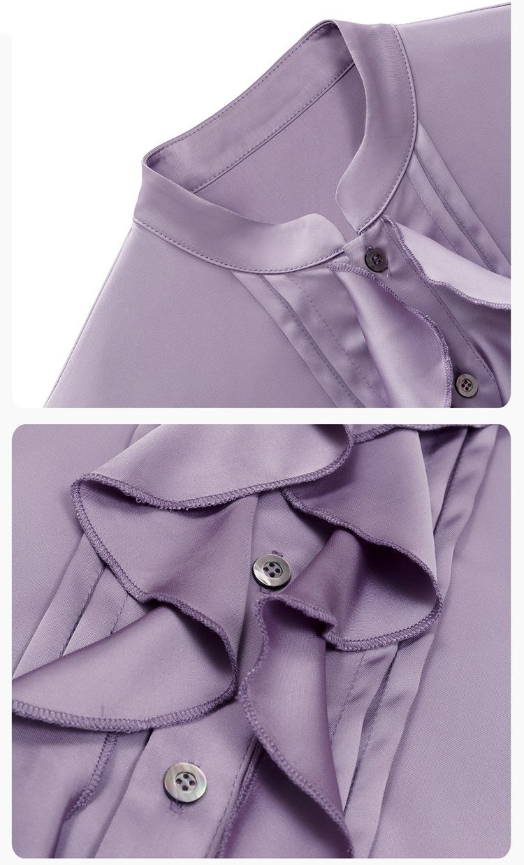 Close-up of stand collar and layered ruffle placket of lilac blouse.
