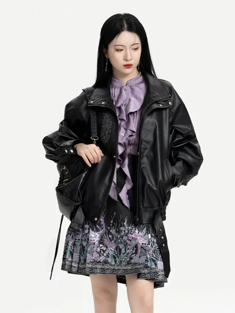 Model draping oversized black leather jacket over shoulders in Chinese punk outfit.