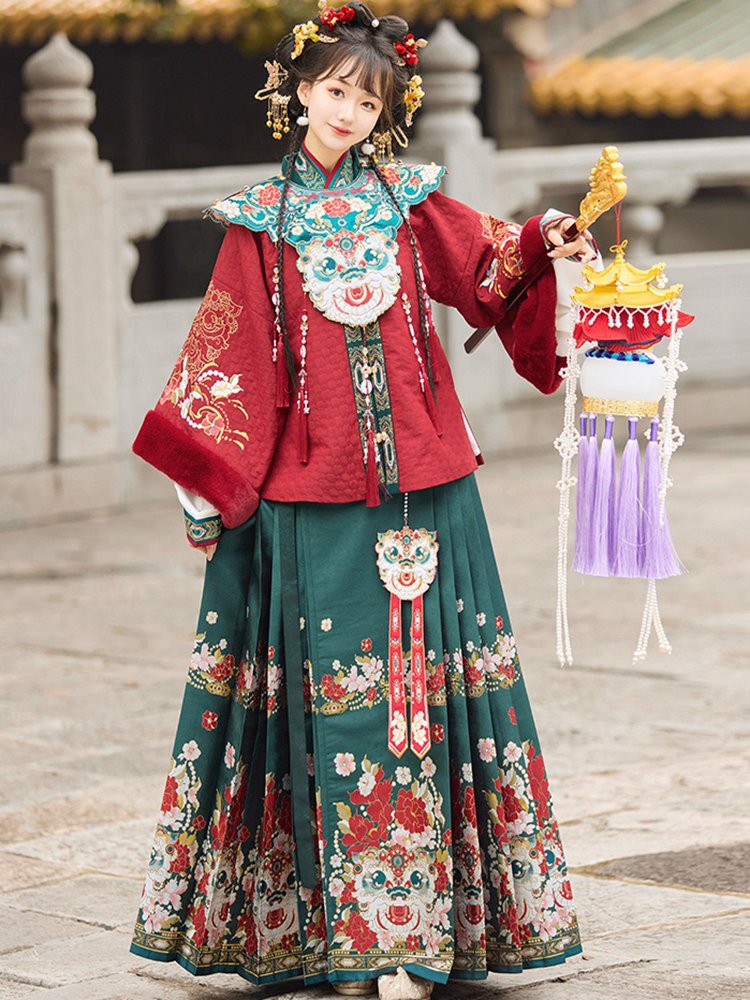 Model wearing red embroidered Hanfu set with floral horse-face skirt