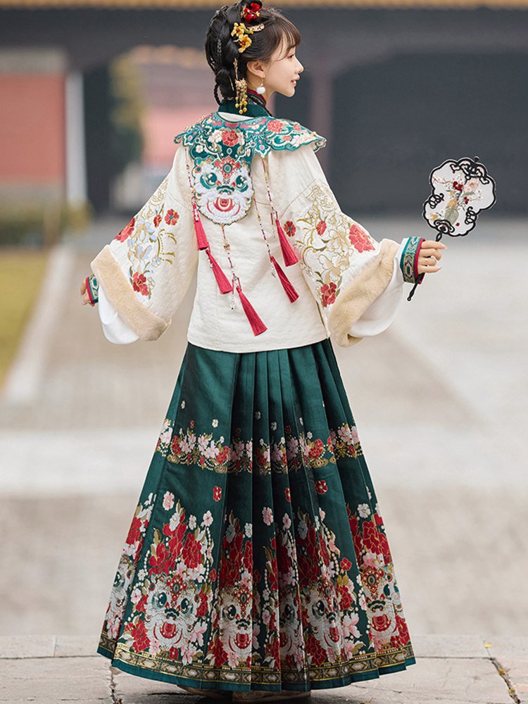 Model wearing green brocade Hanfu outdoors