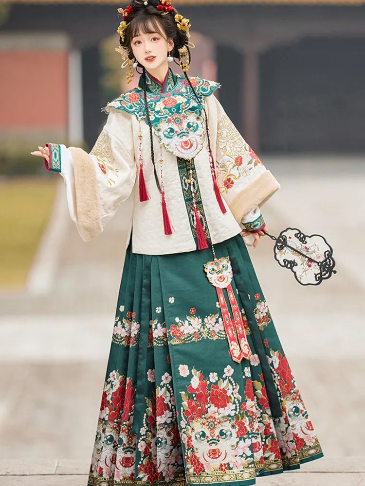 Model wearing green Hanfu with gold embroidery details