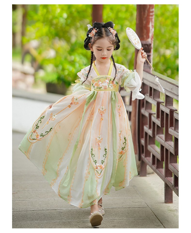 Girl walking in pastel embroidered Hanfu dress