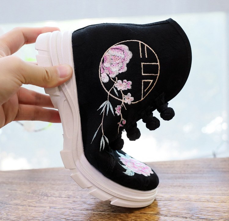 Black embroidered Hanfu ankle boots close-up