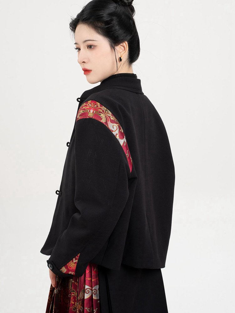 Side view showing brocade shoulder details on black Hanfu hoodie