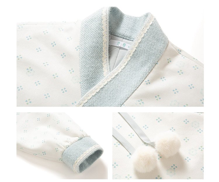 Close-up of the snow-blue chenille collar and pompom tie