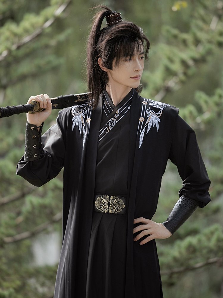 Close-up of men’s black Hanfu robe with bamboo embroidery details.
