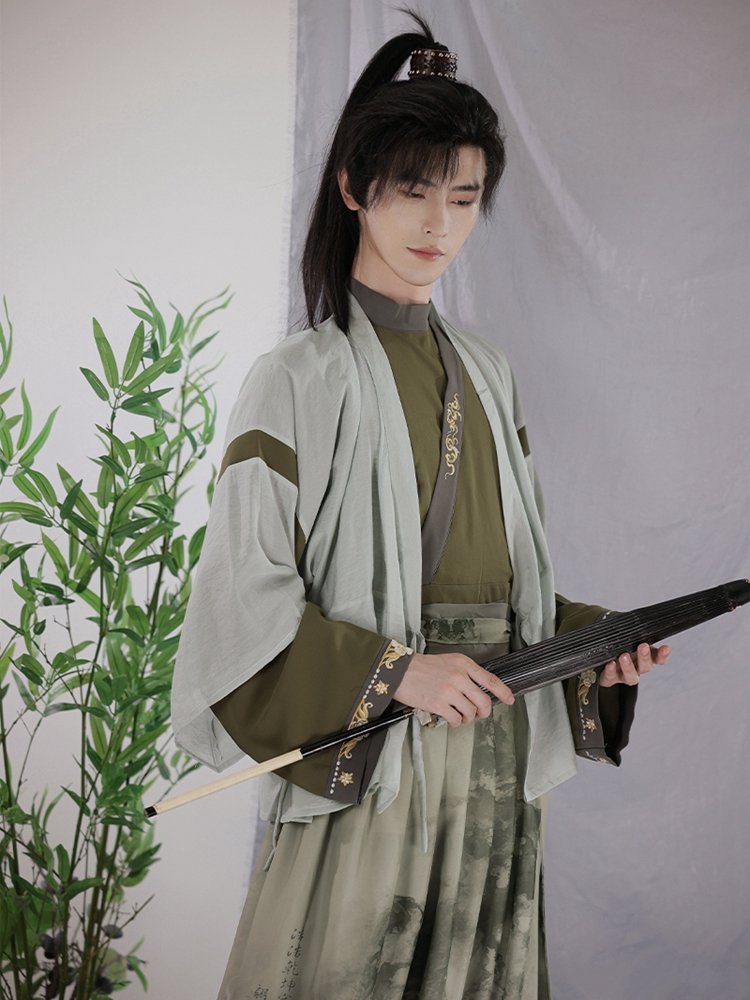 Collar and sleeve detail of light green Jin-style chiffon Hanfu for men.