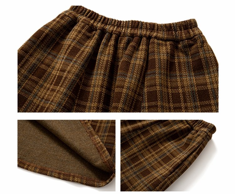 Close-up of brown plaid skirt with gathered waistband
