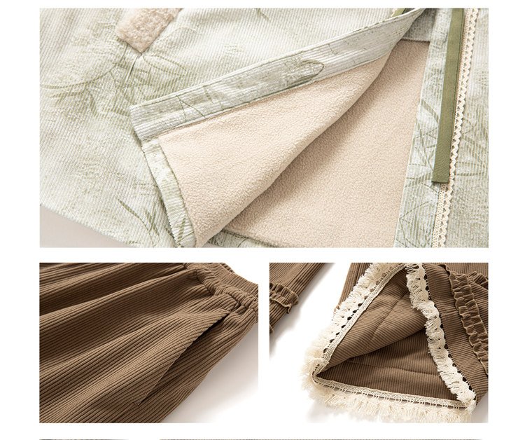 Close-up of bamboo leaf embroidery and sleeve design.