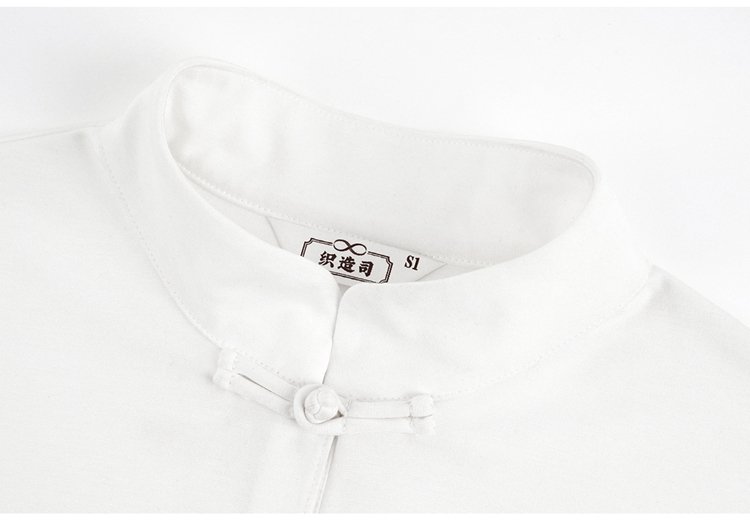 Close-up of white Hanfu top collar and button design