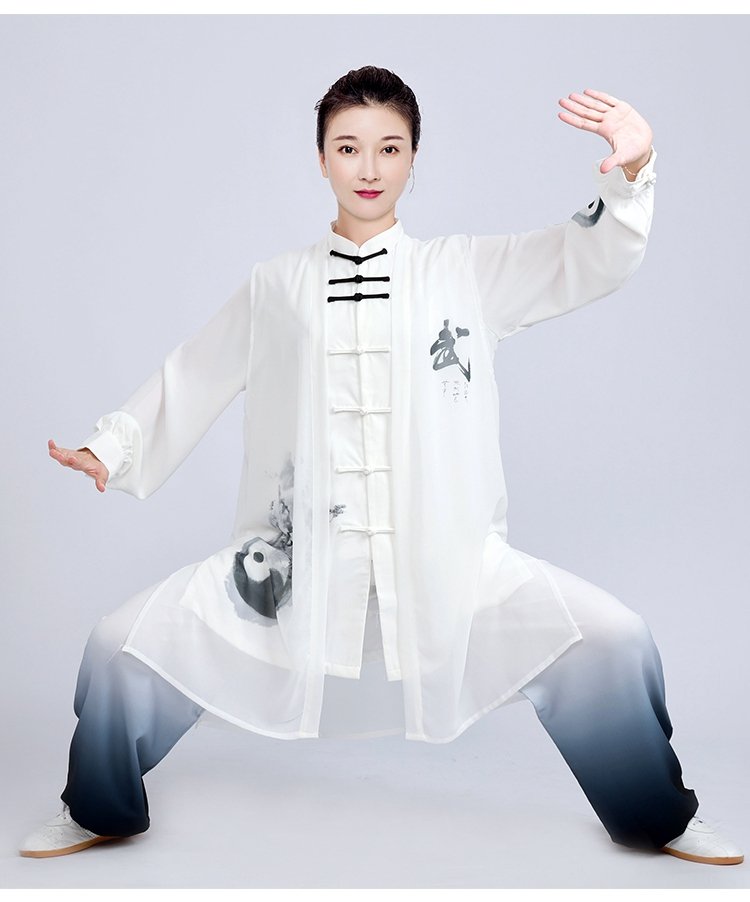 Woman performing Tai Chi in ink robe