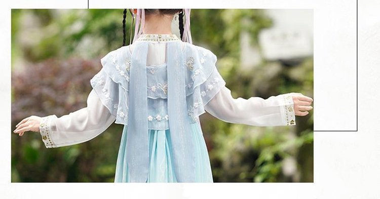 Back view of a child Hanfu dress showing a delicate bow and embroidery