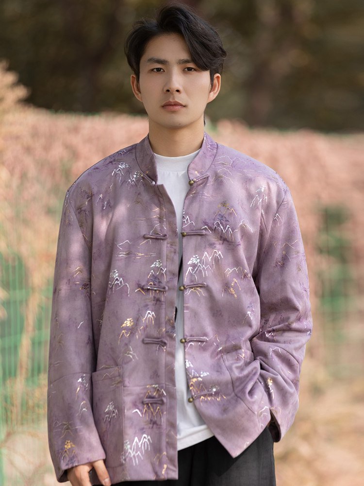 Model in a purple Chinese suede jacket with frog buttons and pockets, hands casually in pockets.