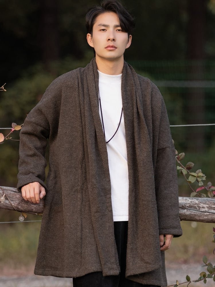 Front view of a man wearing a coffee-colored Hanfu-style long winter cardigan with an open-front design.