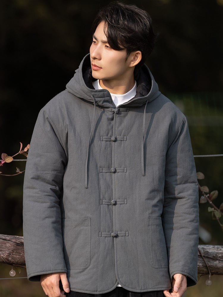 Close-up front view of a gray hooded Chinese winter jacket featuring frog buttons and padded winter design.