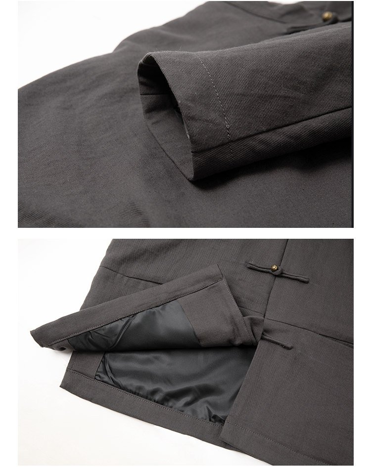 Close-up of the fabric texture, inner lining, and hem of a gray Chinese Tang jacket.