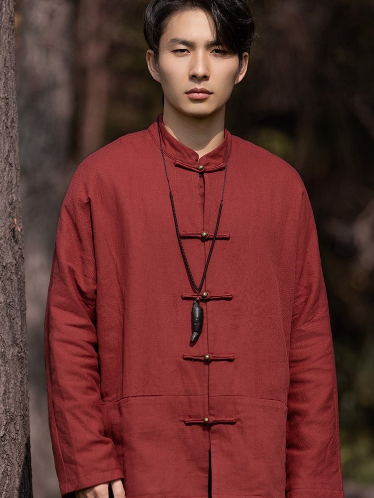 Front view of a red men’s Chinese Tang jacket featuring a mandarin collar and traditional frog buttons.