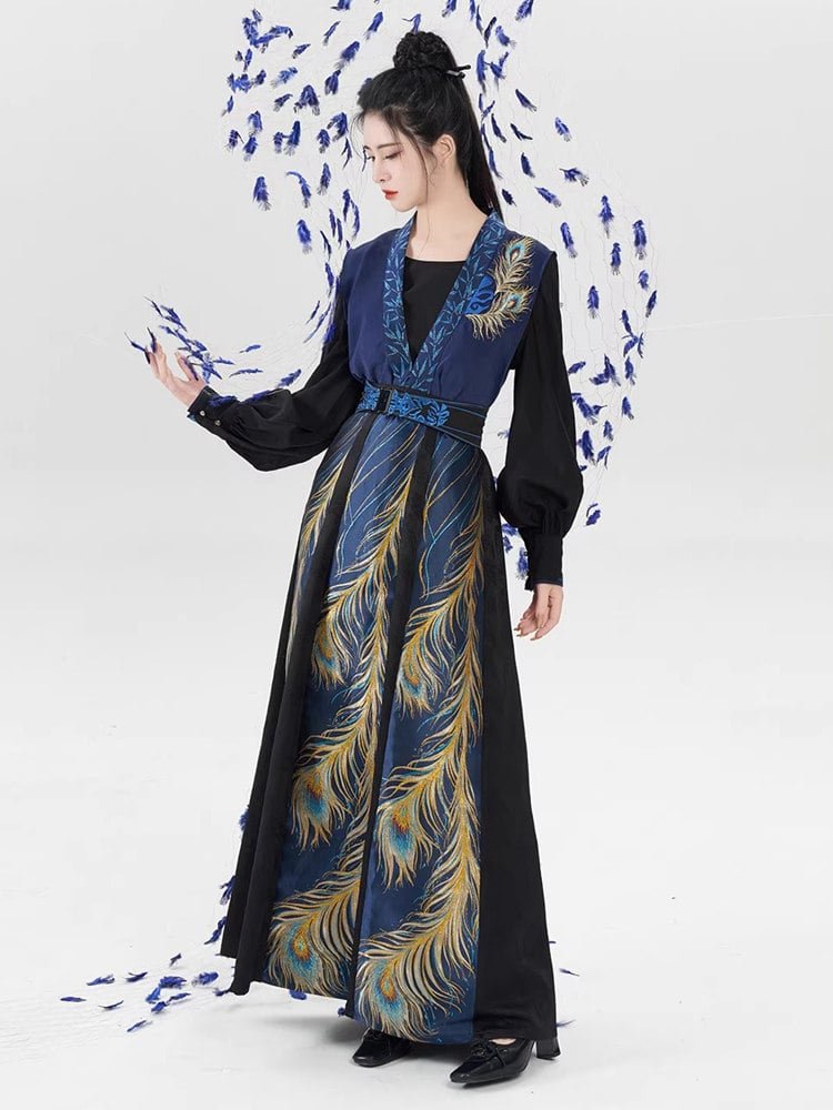 Model in full-length embroidered peacock dress
