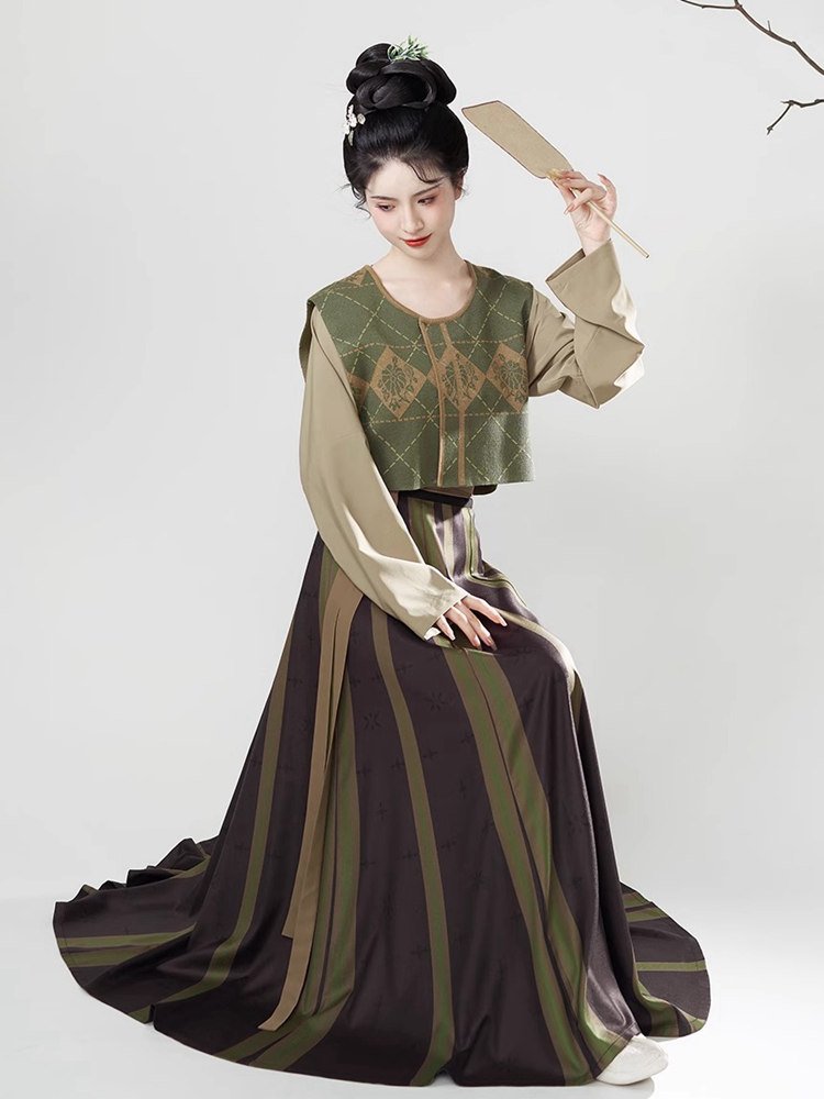 Side pose of green Tang style Hanfu with flowing striped skirt
