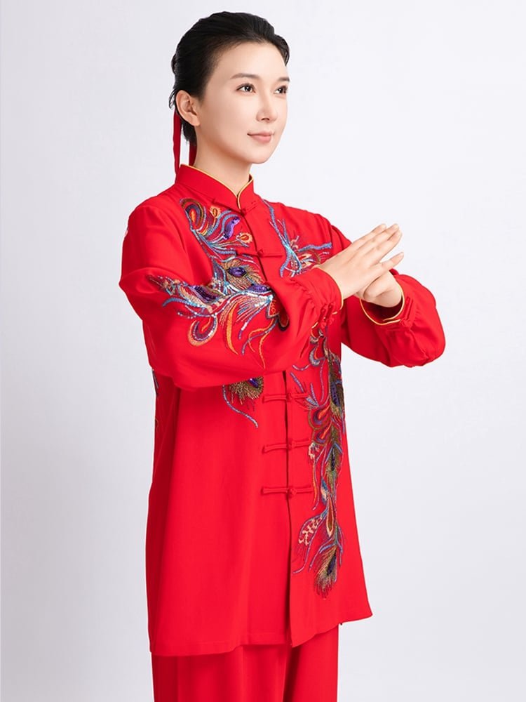 Woman standing in red embroidered Tai Chi costume