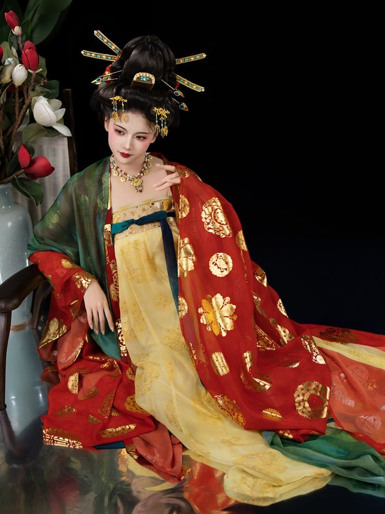 Model sitting in royal Tang style Hanfu dress with gold embroidery and red robe