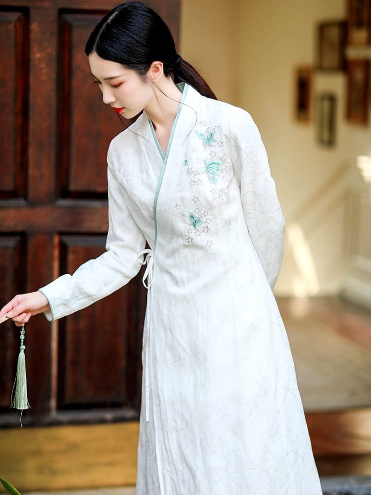Portrait of woman wearing embroidered silk linen Hanfu dress