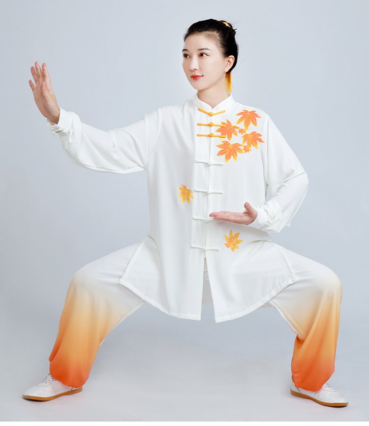 woman in silk linen tai chi outfit holding sword