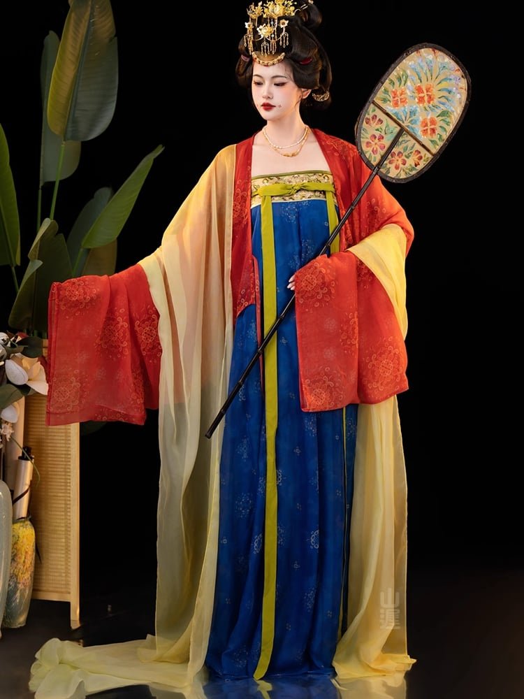 Model wearing the Star Bridge Tang Dynasty ruqun, showing full-body front view with flowing yellow and red shawl.