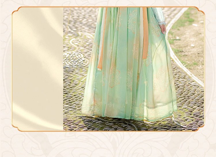 Close-up of the dress fabric texture and hem embroidery
