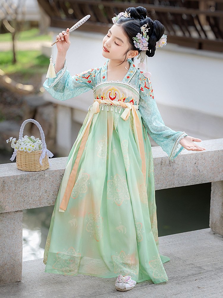 Girl walking gracefully in a green Chinese Tang-style princess dress