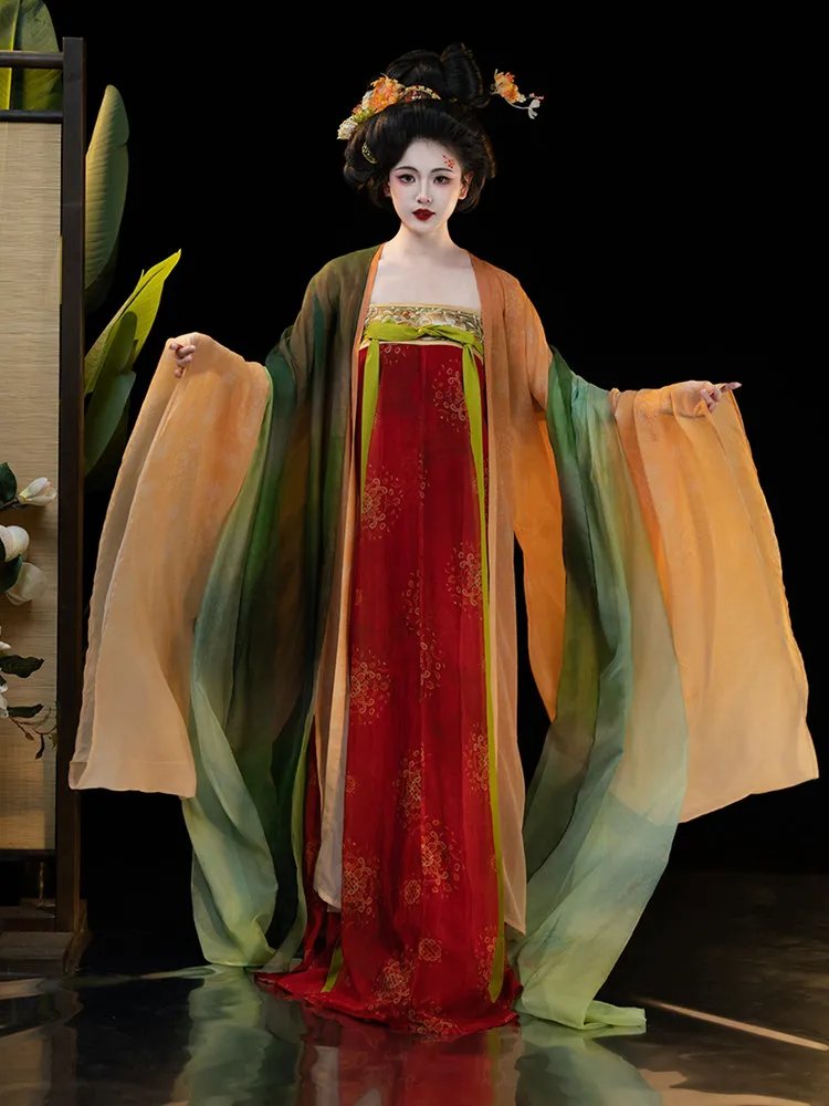 Model standing in full-body front view wearing Tang Dynasty restoration hanfu with red skirt and large flowing sleeves