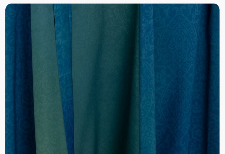 Close-up fabric texture of Tang style Hanfu dress in blue-green gradient linen