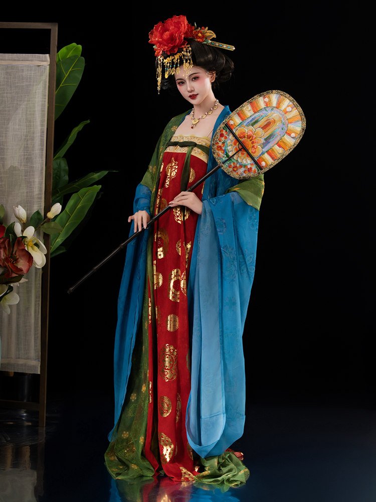 Side pose of Tang dynasty style Hanfu with blue robe and red embroidered skirt