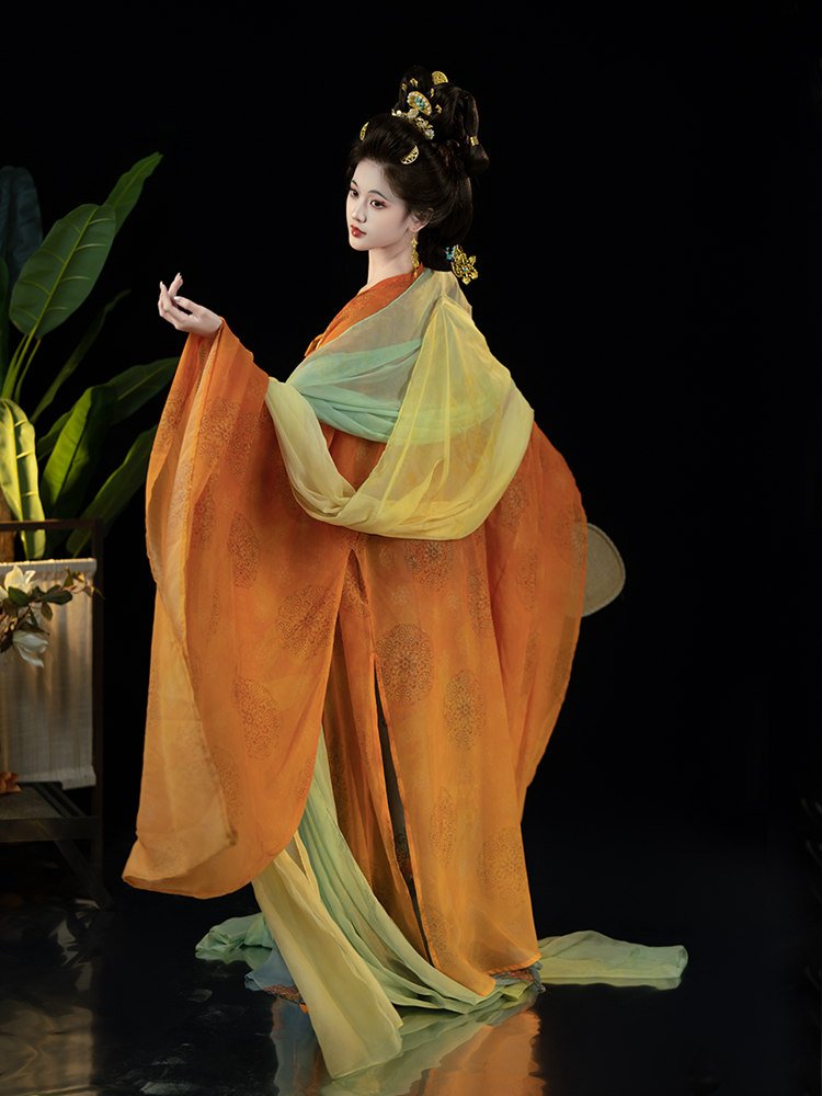 Gradient Tang dynasty Hanfu dress in orange and green, side-angle pose