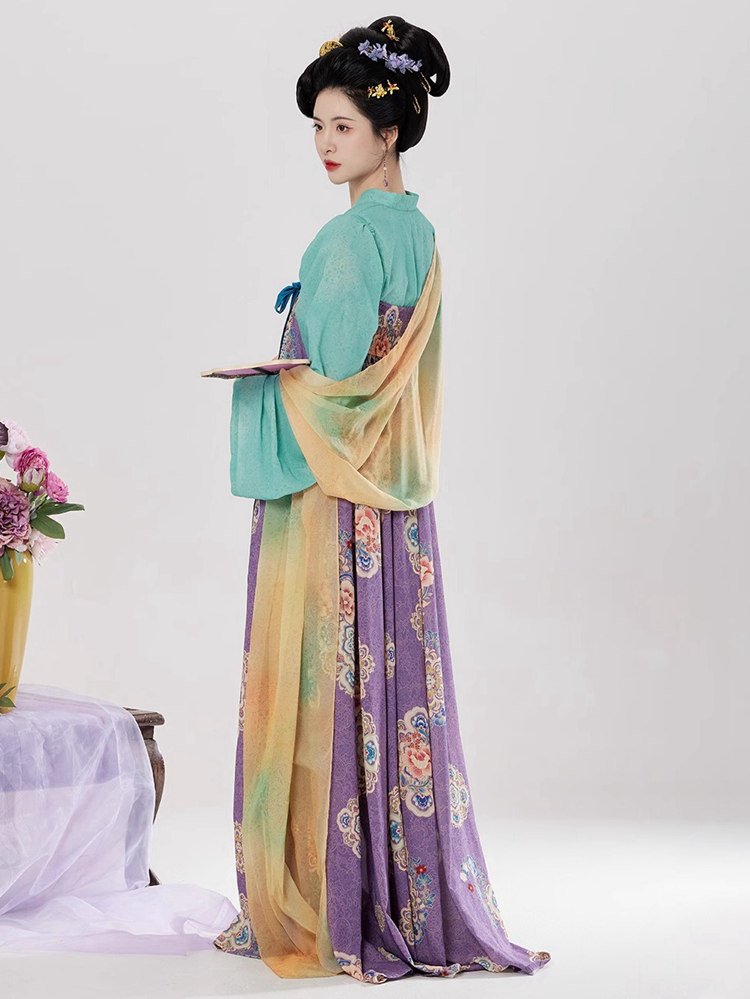 Side profile of Tang style Hanfu dress with orange and lavender color gradient