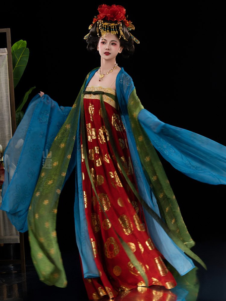 Model walking in palace-style Tang Hanfu dress with flowing blue chiffon sleeves