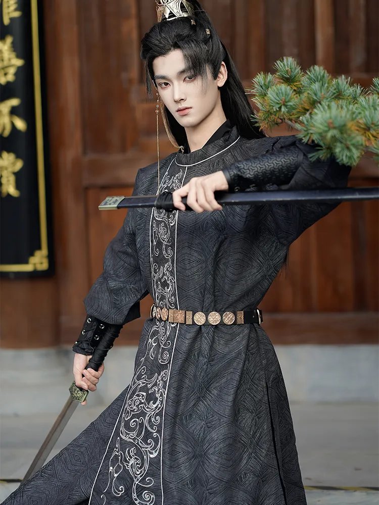 Tang-style black Hanfu robe for men in motion, showcasing ancient Chinese warrior aesthetics.