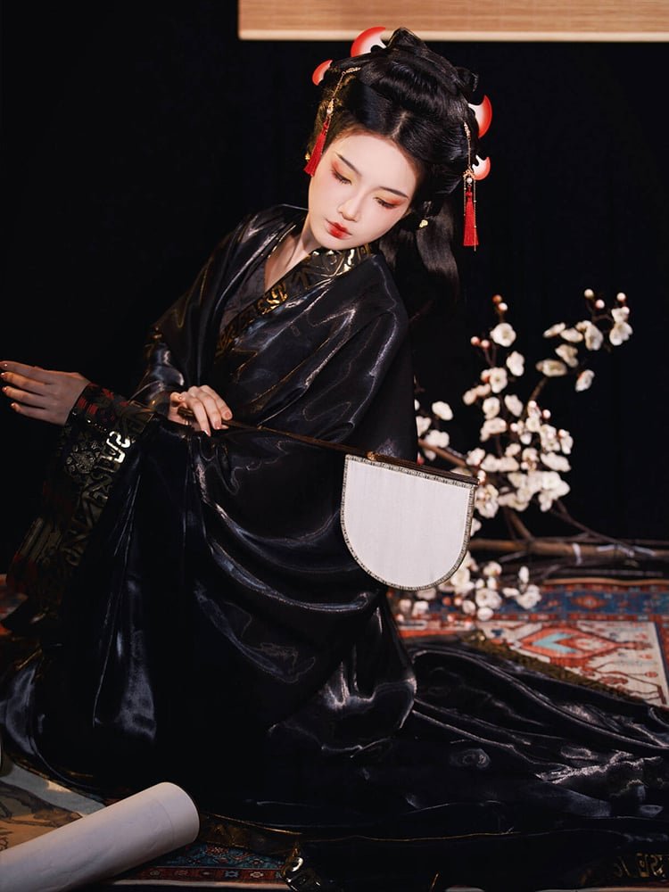 Full outfit of Warring States style women’s Hanfu robe in black with brocade borders.