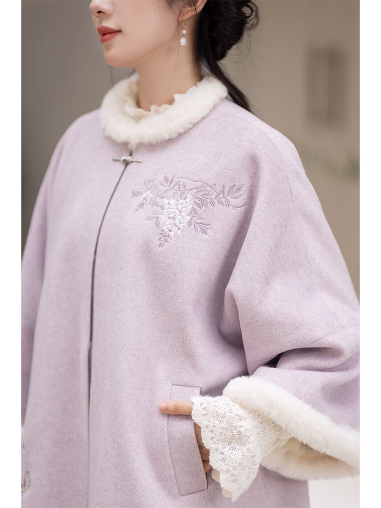 Close-up showing pocket design and fleece-trimmed sleeves of lavender Hanfu coat