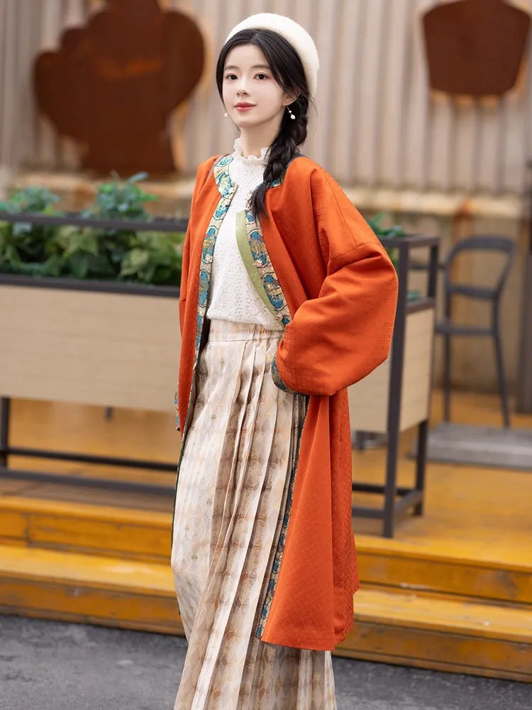 Woman wearing winter Hanfu with Ao jacket and Mamian skirt